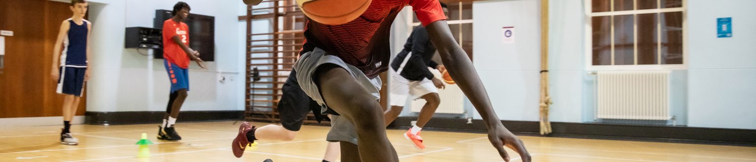 Older running with Basketball