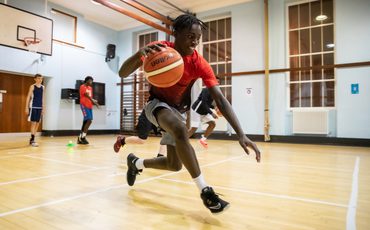 Older running with Basketball